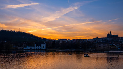 Fototapeta premium Beautiful sunset on the Vltava river. Prague city, CZ