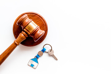 Property auction. Judge gavel near house on white background top-down copy space