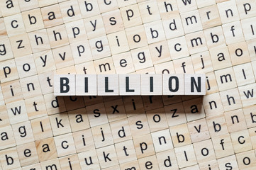 Obraz premium Billion Word Written In Wooden Cube