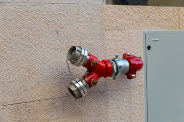 powerful modern hydrant to extinguish a fire on the streets of Lisbon