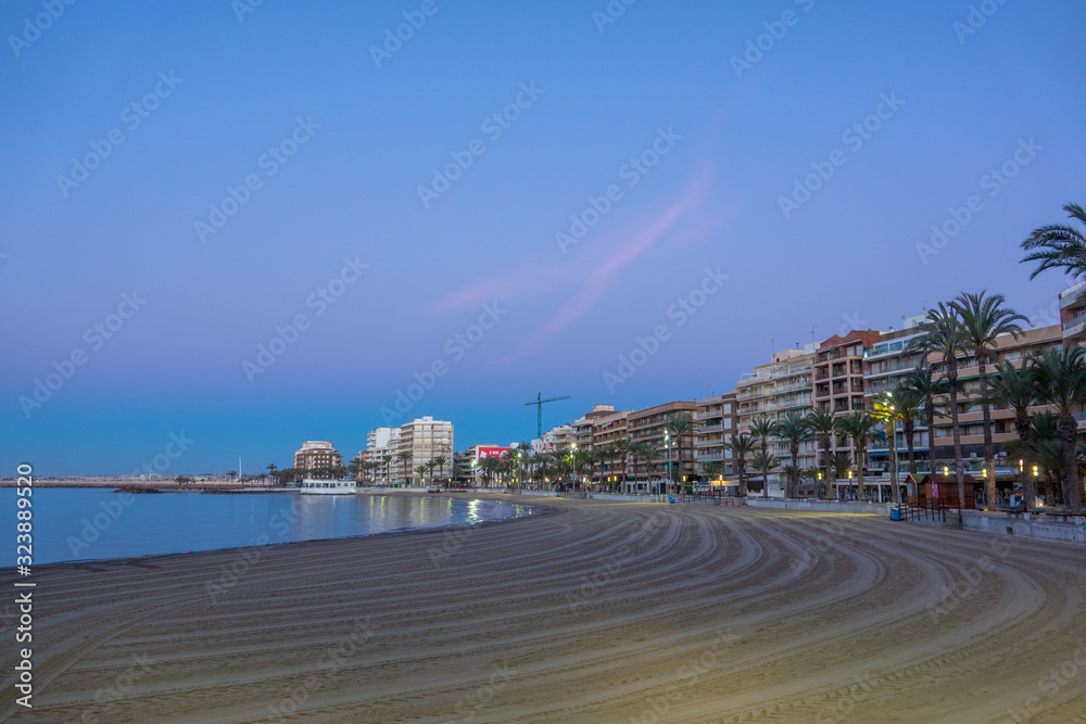 Poster Beach street of Torrevieja Spain during sunrise