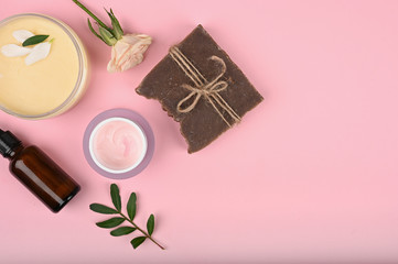Fototapeta na wymiar natural skincare cosmetics. cream care in a jar with a beautiful rose. anti-aging cream. Cream for skin care. for hands. for face. cosmetics for care.