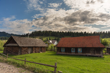Fototapeta na wymiar Beautiful mountain houses in the summer season in the Carpathians