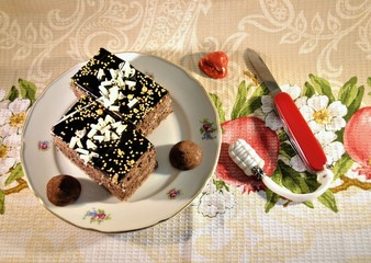 Homemade cake delicious gourmet food with truffle chocolate and folding knife color background