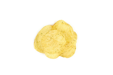 pile of ribbed potato chips isolated on white background