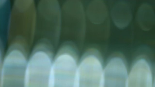 4 different slow moving light leak spills to act as overlays for your footage.