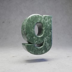 Green marble letter G lowercase on concrete background