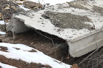 Construction waste with elements of and destroyed old structures at municipal landfill