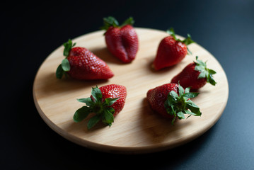 Strawberries on round wood tray