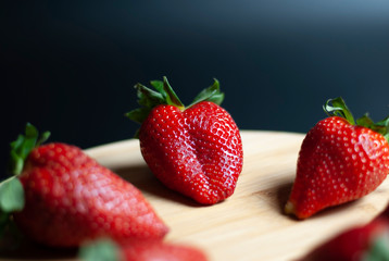 Strawberries on round wood tray