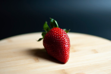 Strawberries on round wood tray