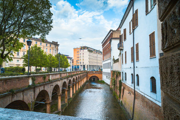 Fototapeta na wymiar Rio of Mantova (Rio di Mantova), the famous canal that crosses the ancient city