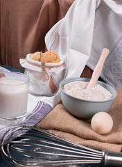 Jar of biscuits and cup of milk