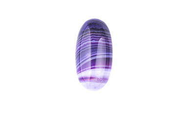 Purple cabochon stone on a white background, costume jewelry