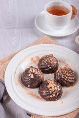 chocolate and cup of tea on the table