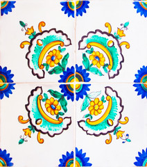 Detail of the traditional tiles from facade of old house. Decorative tiles.Valencian traditional tiles. Floral ornament.