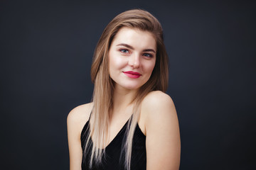 Fototapeta premium Portrait of beautiful lady with natural makeup and smooth healthy skin
