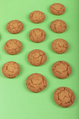 Biscuits on table with green background
