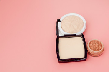 Tonal foundation and highlighter, base for make-up in the form of a cushion. Highlighter powder cosmetic product top view