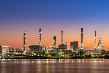 Plakat oil refinery at twilight
