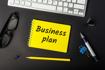 Business plan on office workplace. Startup and start a new business concept