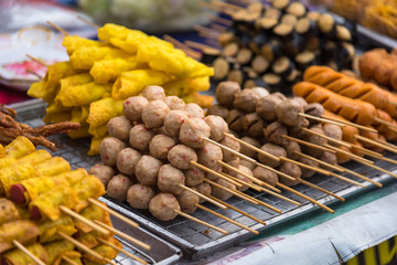 Meatballs with bamboo, wood stick. Traditional Street Food Thailand.