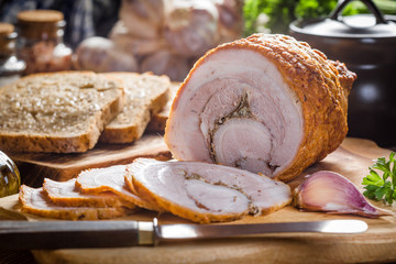 Tasty breakfast - dark bread with baked bacon.