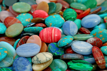 Pile of multi color semi precious stones for background and wallpaper