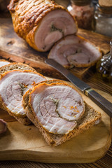 Tasty breakfast - dark bread with baked bacon.