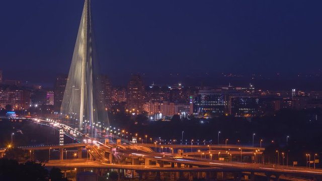 Time lapse of city traffic on the bridge at night