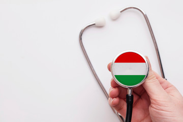 Hungary healthcare concept. Doctor holding a medical stethoscope.