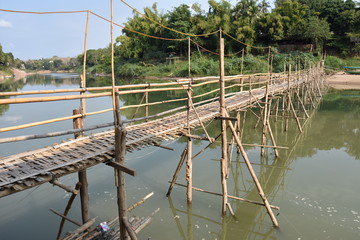 Fototapeta na wymiar Dry Season Bamboo Bridge, Luang Prabang, Laos