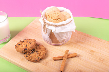 Cup of milk with cinnamon biscuits