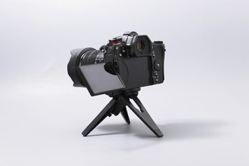 Gomel, Belarus - February 18, 2020: camera on a mini tripod