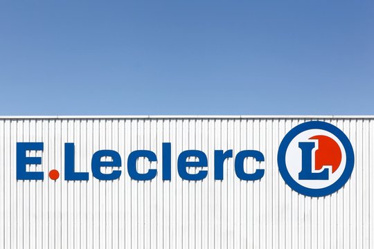 Decines, France - June 13, 2019: Leclerc logo on a wall. Leclerc is a French hypermarket chain Leclerc currently has more than 500 locations in France and more than 110 stores in Europe 