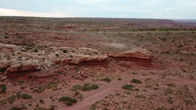 Red Sandstone Hills and Sand in Monument Valley Tribal Park USA, Aerial View of  Aerid Landscape and Interstate Freeway