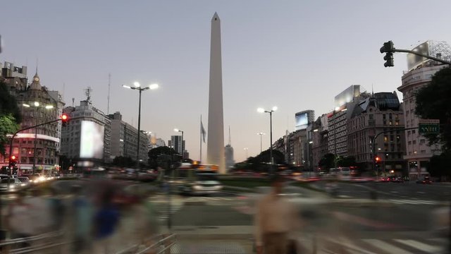 Buenos Aires, Argentina &ndash; Day to Night Time-lapse Obelisk obelisco famous landmark, 9 of July avenue. Commercial Use.