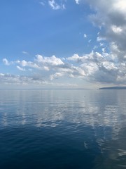 Sky reflection on the surface of the sea, natural colors