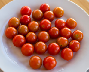 cherry tomatoes close up in white dish