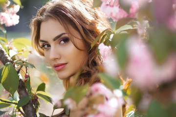 Woman at Blossoming Sakura Tree on Nature