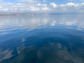 Obraz na płótnie Canvas Sky reflection on the surface of the sea, natural colors