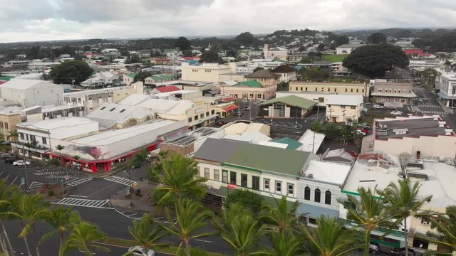 aerial of downtown hilo hawaii from view of ocean dolly back over water