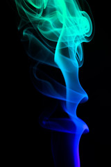 Obraz premium Colored smoke on black background