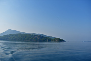 seascape with mountains and blue sky. aegean. Turkey