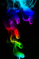 Obraz premium Colored smoke on black background