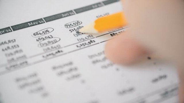 Accountant checks financial report