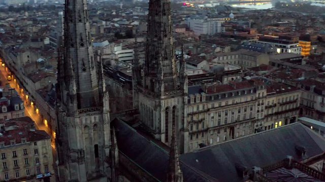 St. Andrew Cathedral and Pey Berland bell tower Bordeaux France, Aerial drone orbit reveal shot