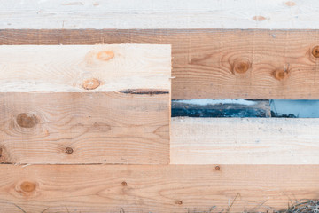 Carved wooden beams for home construction.