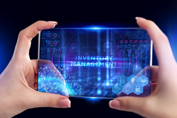 Business, Technology, Internet and network concept. Young businessman working on a virtual screen of the future and sees the inscription: Inventory management