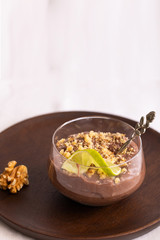 Principe Alberto o Prince Albert is a chocolate mousse whose interior is full of almonds and hazelnuts in crystal bowl on the restaurant table.  Its popular dessert in Canary islands cuisine.